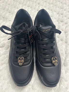 Skechers Men’s Black Lace-Up Sneakers with Gold Skull Charm